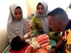 Danyon C Pelopor Brimob Polda Sulsel, Sambangi Bayi Penderita Hirosefalus